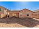 Backyard view of house with patio at 4572 E Silverbell Rd, San Tan Valley, AZ 85143