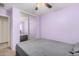 Bedroom with mirrored closet doors and ceiling fan at 4572 E Silverbell Rd, San Tan Valley, AZ 85143