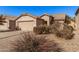 House exterior showcasing a front yard with drought-tolerant landscaping at 4572 E Silverbell Rd, San Tan Valley, AZ 85143