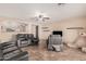 Living room with gray sofas, a large teddy bear, and a view of backyard at 4572 E Silverbell Rd, San Tan Valley, AZ 85143