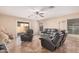 Living room featuring a ceiling fan, recessed lighting, and comfortable seating at 4572 E Silverbell Rd, San Tan Valley, AZ 85143