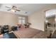 Bright and spacious living room with neutral colors and tiled floors at 45762 W Dirk St, Maricopa, AZ 85139