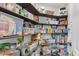 Well-organized pantry with ample shelving for storage at 45762 W Dirk St, Maricopa, AZ 85139