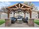 Relaxing pergola with seating and fire pit at 45762 W Dirk St, Maricopa, AZ 85139