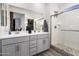 Spa-like bathroom with double vanity and walk-in shower at 4816 S 117Th Ave, Avondale, AZ 85323