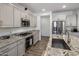 Modern kitchen with granite countertops and stainless steel appliances at 4816 S 117Th Ave, Avondale, AZ 85323