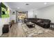 Bright living room with sliding door access to backyard patio at 4816 S 117Th Ave, Avondale, AZ 85323