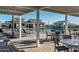 Community pool area with tables and chairs at 4816 S 117Th Ave, Avondale, AZ 85323