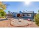 Backyard with patio, grill, and gravel landscaping at 5210 W Ironwood Dr, Glendale, AZ 85302