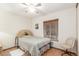 Small bedroom with a double bed and a ceiling fan at 5210 W Ironwood Dr, Glendale, AZ 85302