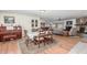 Cozy dining area with wood table and chairs, adjacent to kitchen at 5210 W Ironwood Dr, Glendale, AZ 85302