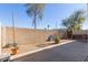 Small backyard with gravel, plants, and a bench at 5239 Rayanna Ct, Phoenix, AZ 85015