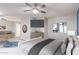 Spacious bedroom with wood-look floors and a ceiling fan at 5239 Rayanna Ct, Phoenix, AZ 85015