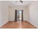 Bedroom with sliding door to patio and ceiling fan at 5239 Rayanna Ct, Phoenix, AZ 85015