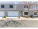 Two-story townhome with attached garage and front landscaping at 5239 Rayanna Ct, Phoenix, AZ 85015