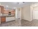 Galley-style kitchen with wood cabinets and stainless steel appliances at 5239 Rayanna Ct, Phoenix, AZ 85015