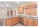 Kitchen features stainless steel appliances and an island at 5239 Rayanna Ct, Phoenix, AZ 85015