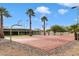 Private backyard basketball court with palm trees at 5540 E Shea Blvd, Scottsdale, AZ 85254