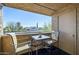 Small balcony with table and chairs, offering an outdoor space at 5877 N Granite Reef Rd # 2224, Scottsdale, AZ 85250