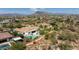 Aerial view of house with pool and surrounding desert landscape at 6015 E Calle De Las Estrellas --, Cave Creek, AZ 85331