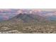 Aerial view of community with mountain views and desert landscape at 6015 E Calle De Las Estrellas --, Cave Creek, AZ 85331