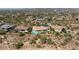 Aerial view of house, pool, and surrounding desert landscape at 6015 E Calle De Las Estrellas --, Cave Creek, AZ 85331