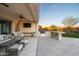 Outdoor kitchen and patio area with seating and a grill at 6015 E Calle De Las Estrellas --, Cave Creek, AZ 85331