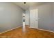 Spacious bedroom with tiled floors and neutral walls at 6233 W Maya Dr, Phoenix, AZ 85083