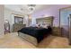 Spacious bedroom with large bed and dresser at 6233 W Maya Dr, Phoenix, AZ 85083