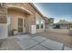 Front entry of the house with a stone facade and security door at 6233 W Maya Dr, Phoenix, AZ 85083