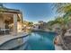 Relaxing backyard with a large pool and patio area at 6233 W Maya Dr, Phoenix, AZ 85083