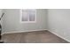 Bright and airy bedroom with neutral carpeting and large window at 6251 E Bramble Berry Ln, Cave Creek, AZ 85331