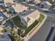 Aerial view of a private residence with large backyard, swimming pool, and well-manicured lawn at 638 W Nido Ave, Mesa, AZ 85210