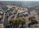 Aerial view of a local park with mature landscaping and a walking trail at 638 W Nido Ave, Mesa, AZ 85210