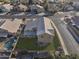 Aerial view of a private residence with large backyard, swimming pool, and well-manicured lawn at 638 W Nido Ave, Mesa, AZ 85210