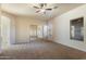 Bright bedroom with a mirrored closet, ceiling fan, and plenty of natural light at 638 W Nido Ave, Mesa, AZ 85210