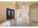 Welcoming foyer with high ceilings, tiled floors, a chandelier, and a view into the living spaces at 638 W Nido Ave, Mesa, AZ 85210