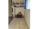 Small bonus room with built-in shelving and tile flooring at 720 N 82Nd St # E210, Scottsdale, AZ 85257