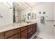 Bathroom with double vanity and walk-in shower at 7373 S Bonarden Ln, Tempe, AZ 85283