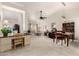 Open concept dining area with adjacent kitchen and living room at 7373 S Bonarden Ln, Tempe, AZ 85283