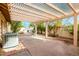 Covered patio with brick flooring and pergola at 7373 S Bonarden Ln, Tempe, AZ 85283