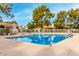 Community pool with surrounding patio furniture at 7373 S Bonarden Ln, Tempe, AZ 85283