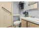 Clean bathroom with toilet, sink, shower, and grab bars at 7807 E Main St # Cc-106, Mesa, AZ 85207