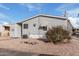 Gray mobile home with gravel yard at 7807 E Main St # Cc-106, Mesa, AZ 85207