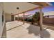 Covered patio with tile flooring, offering an outdoor entertaining space at 8309 E Navarro Ave, Mesa, AZ 85209