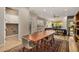 Bright dining area with mid-century modern table and chairs at 8729 E Indigo St, Mesa, AZ 85207