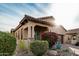 Charming house with stone exterior and lush landscaping at 8729 E Indigo St, Mesa, AZ 85207