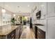 Spacious kitchen with granite countertops and modern cabinetry at 8729 E Indigo St, Mesa, AZ 85207