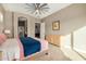 Serene main bedroom with king-size bed and en-suite bathroom access at 8729 E Indigo St, Mesa, AZ 85207