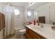 Clean bathroom with tub, shower, and updated vanity at 9321 E Diamond Dr, Sun Lakes, AZ 85248